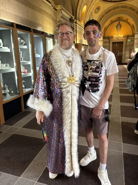 The Lord Mayor in ceremonial robes with a Leeds resident